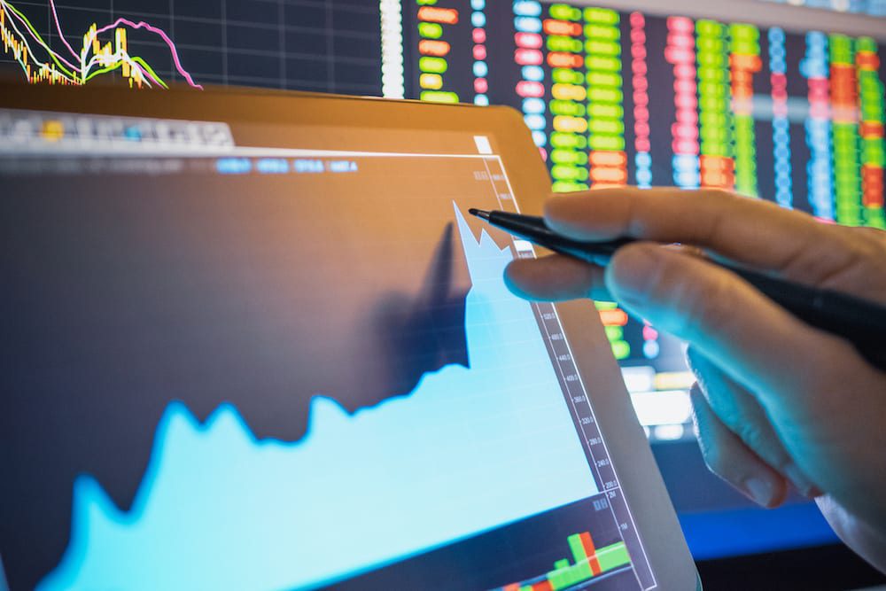Businessman analysis stock chart