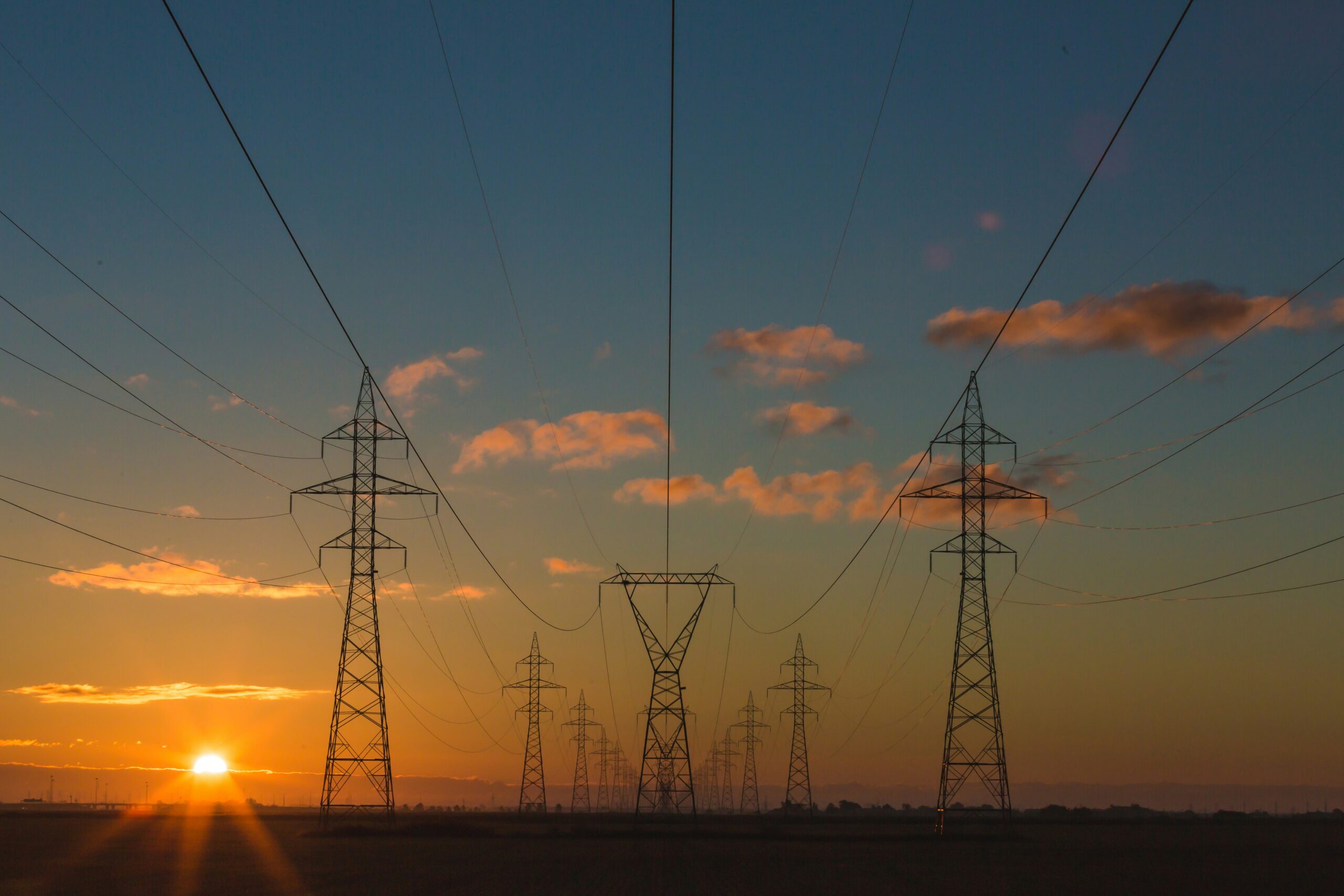image of powerlines at sunset